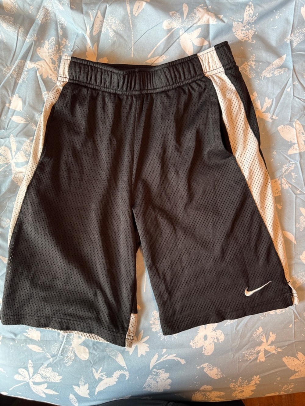 Nike Youth Black Athletic Shorts with White Side Stripes